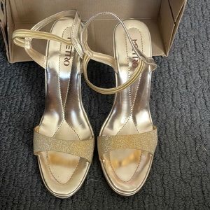 New, never worn golden heels